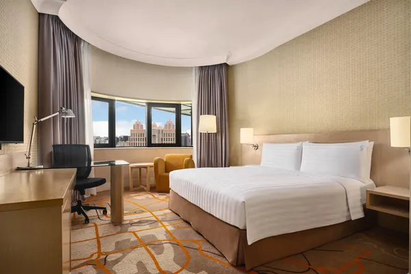 King Junior Suite - Get a good night sleep in our 60sqm suite that features separate living and dining areas.